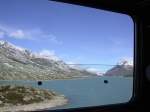 Wie im Film gleitet der Lago Bianco auf dem Berninapass 2250m/.M.
am geffneten Zugsfenster vorbei. (18.09.2001)