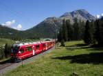 Zwischen den Bahnhfen Morteratsch und Surovas ist R 1656 von Tirano kommend am 19.08.2012 unterwegs nach St. Moritz.