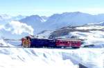 RhB Dampfschneeschleuder-Extrazug fr GRAUBNDEN TOURS 9448 von Alp Grm nach Ospizio Bernina am 31.01.1998 bei Scala zwischen Alp Grm und Ospizio Bernina mit Dampfschneeschleuder X d rot 9213 -