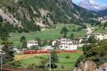 RhB Regionalzug 454 von Tirano nach St.Moritz am 16.07.1989 kurz vor Kreisviadukt Brusio mit Triebwagen ABe 4/4 III 52 - 2x B - BD. Hinweis: gescanntes Dia
