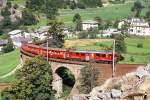 RhB Regionalzug 454 von Tirano nach St.Moritz am 16.07.1989 auf Kreisviadukt Brusio mit Triebwagen ABe 4/4 III 52 - 3x B. Hinweis: gescanntes Dia
