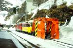 RhB Schneerum-Extrazug fr GRAUBNDEN TOURS 4454 von Alp Grm nach km 24,000 am 01.03.1997 in Alp Grm mit Triebwagen ABe 4/4II 47 - B 2091 - Xk 9132. Hinweis: Rckansicht, gescanntes Dia
