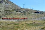 RhB REGIONALZUG 460 von Tirano nach St.Moritz am 30.08.1993 bei Alp Bondo zwischen Ospizio Bernina und Bernina Lagalb mit Triebwagen ABe 4/4III 55 - ABe 4/4 II 43 - B 2456 - B 2311 - D 4035 - 4x Rpw.
