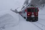 ABe 4/4 Nr. 51 und 56 mit R1629 St Moritz - Poschiavo in Alp Grüm, 30.1.14.