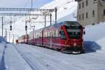 RhB ABe 8/12 3509  Placidus Spescha  hat soeben mit dem Regio nach Tirano den höchsten Bahnhof des RhB-Netzes erreicht. Ospizio Bernina, 14.02.2014