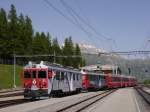 Doppeltraktion der beiden Triebwagen ABe 4/4 III 51  Poschiavo  und 56  Corviglia  vor RhB Bernina-Express BEX 973 St.