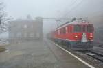 Ausgestorben war der Berninapass heute. Aufgrund des sehr schlechten Wetters waren wir die einzigen Reisenden im Zug, und auch die einzigen am Bahnhof von Alp Grm: ABe 4/4 III 54 und 56  Repower  sowie ein AB und ein BD als Regio 1629, 04.11.2014.