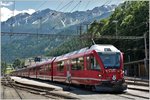 BerninaExpress 950 mit ABe 8/12 3506 in Poschiavo.