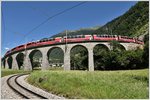 BEX951 mit ABe 8/12 3505 auf dem Kehrviadukt von Brusio.