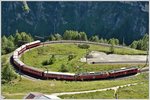 R1660 mit ABe 4/4 III 54  Hakone  und 51  Poschiavo  erreicht soeben Alp Grüm. (17.07.2016)