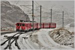 R1936 mit ABe 4/4 III 53  Tirano  und 54  Hakone  in Bernina Suot.