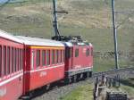 RhB - E-Lok Ge 4/4 627 mit 1 A + 1 B Unterweg im Engadin vor Zuoz am 20.04.2007