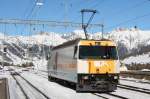 Ge 4/4 III 644  Savognin  mit Werbung fr  Radio und Television Rumantsch  hat soeben den Bernina-Express am 2.02.2007 nach Pontresina gebracht.