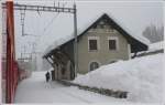 Vermutlich der schwierigste Stationsname fr Aussenstehende auf dem Netz der RhB ist dieser Bahnhof im Oberengadin. Tschinuoschgel sagen die Einheimischen dazu. (17.02.2009)