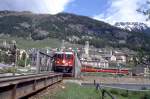 RhB BERNINA-EXPRESS A 501 von Chur nach Tirano am 07.06.1992 Ausfahrt Samedan auf der Inn-Brcke mit E-Lok Ge 4/4II 622 - B - B - BD 2474 - A - A - B - B.