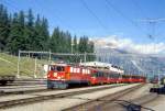 RhB BERNINA-EXPRESS B 321 von Chur nach Tirano am 11.09.1995 Einfahrt Pontresina mit E-Lok Ge 6/6II 604 - B 2463 - B 2492 - A 1271 - B 2497 - B 2465.