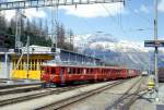 RhB PENDELZUG 325 von Samedan nach Pontresina mit BERNINA-EXPRESS B (Winter)-Kompo von Chur nach Tirano am 10.05.1995 Einfahrt Pontresina mit Triebwagen ABe 4/4 502 - AB 1515 - BDt 1722 - B 2494 - A