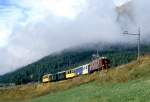 RhB Dienst-EXTRAZUG fr RHTIA INCOMING 9217 von Samedan nach Zuoz am 04.09.1996 zwischen La Punt und Madulain mit Oldtimer-E-Lok Ge 4/6 353 - WRS 3821 - B 2096 - A 1102 - B 2060 - B 2091.