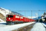 RhB REGIONALZUG 760 von Scuol nach St.Moritz am 09.02.1997 in Scuol mit E-Lok Ge 6/6 II 702 - D 4203 - AB 1524 - AB 1530 - B 2381 - B 2326 - B 2266 - B 2281 - B 2251 - AB 1567.