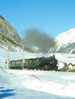 RhB DAMPFZUG 3768 von Scuol nach Samedan am 02.03.1997 bei S-chanf mit Dampf-Lok G 4/5 108 - B 2245 - D 4052I - B 2060 - A 1102.
