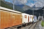 Ge 4/4 III 650  Seewis-Valzeina  mit COOP-Wagen und Postcontainern verlässt Zernez Richtung Vereina und Landquart. (06.09.2016)