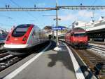 SBB - ICN Le Corbusier neben 460 009-4 im Bahnhof Lausanne am 16.02.2013