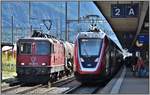 420 297-4 und IC3 571 mit einem RABDe502 in Landquart.