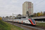 RABDe 502 010-7 Twindexx fährt Richtung Bahnhof Muttenz.