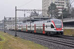 RABe 511 124 fährt Richtung Bahnhof Muttenz.