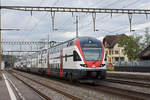 RABe 511 024, auf der S11, durchfährt den Bahnhof Rupperswil.