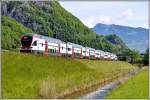 RE3811 mit 511 015 zwischen Trübbach und Sargans am Binnenkanal- (08.05.2014)