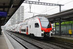 RABe 512 039-4 KISS durchfährt am 07.06.2025 bei strömendem Regen den Bahnhof Pratteln.
