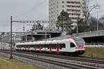 RABe 521 018, auf der S1, fährt Richtung Bahnhof Muttenz.