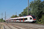 RABe 521 015, auf der S1, hat den Bahnhof Kaiseraugst verlassen und fährt Richtung Augarten.