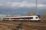 RABe 521 012 steht auf einem Nebengleis beim badischen Bahnhof.