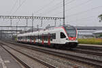 RABe 523 034, auf der S26, durchfährt den Bahnhof Rupperswil.