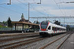 RABe 523 033, auf der S26, durchfährt den Bahnhof Rupperswil.