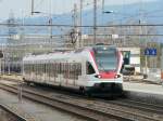 SBB - Triebzug RABe 523 013-6 als Regio nach Baar bei der einfahrt in den Bahnhof von Rotkreuz am 10.04.2010