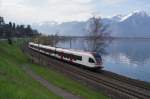 RABe 523 022-2 fhrt am 26.3.11 von Villeneuve Richtung Montreux, aufgenommen bei Veytaux-Chillon.