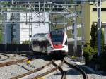 SBB - Treibzug RABe 523 041-7 bei der einfahrt in den Bahnhof Lenzburg am 201.08.2011