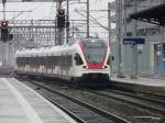 SBB - Triebzug RABe 523 041-7 bie der einfahrt im Bahnhof Aarau am 25.03.2013