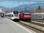 SBB - Triebzug RABe 523 027-6 neben 460 088-8 im Bahnhof von Yverdon-les-Bains am 04.09.2013