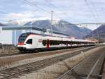 SBB/TILO - Ausfahrt des Triebwagen RABe 524 111 aus dem Bahnhof Giubiasco am 27.02.2015