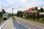 BLS  MUTZ (Serie 515) der S-Bahnlinie Bern - Schwarzenburg: Zug 515 018 neben der Gastwirtschaft zur Schwarzwasserbrücke (heute Ruhetag).