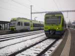 NINA RABe 525 10 und Ltschberger RABe 535 112 in Kerzers. 13.02.10