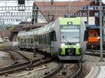 bls - Triebzge RABe 535 108-5 zusammen mit RABe 525 002-2 bei der einfahrt in den Bahnhof Spiez am 20.05.2009