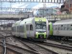 bls - Triebzug Ltschberger RABe 535 110-1 bei Rangierfahrt im Bahnhofsareal von Spiez am 25.02.2011