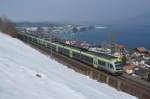 RABe 535 120-0, RABe 535 107-7 und RABe 535 119-2 befinden sich am 26.02.2013 in Einigen.