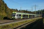 RABe 535 121-8 und RABe 535 115-0 befinden sich am 18.10.2014 in Mülenen.