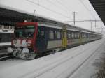 4-teiliger NPZ als Regio 7858 in Landquart, 31.12.2011.